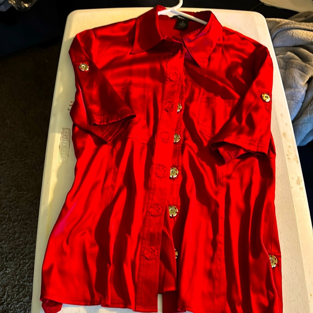 Red silk MEDIUM Bebe blouse with button embellishments. 2 chest pockets.